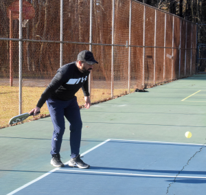Carlos Rosado hits ball pickleball match Montclair Park